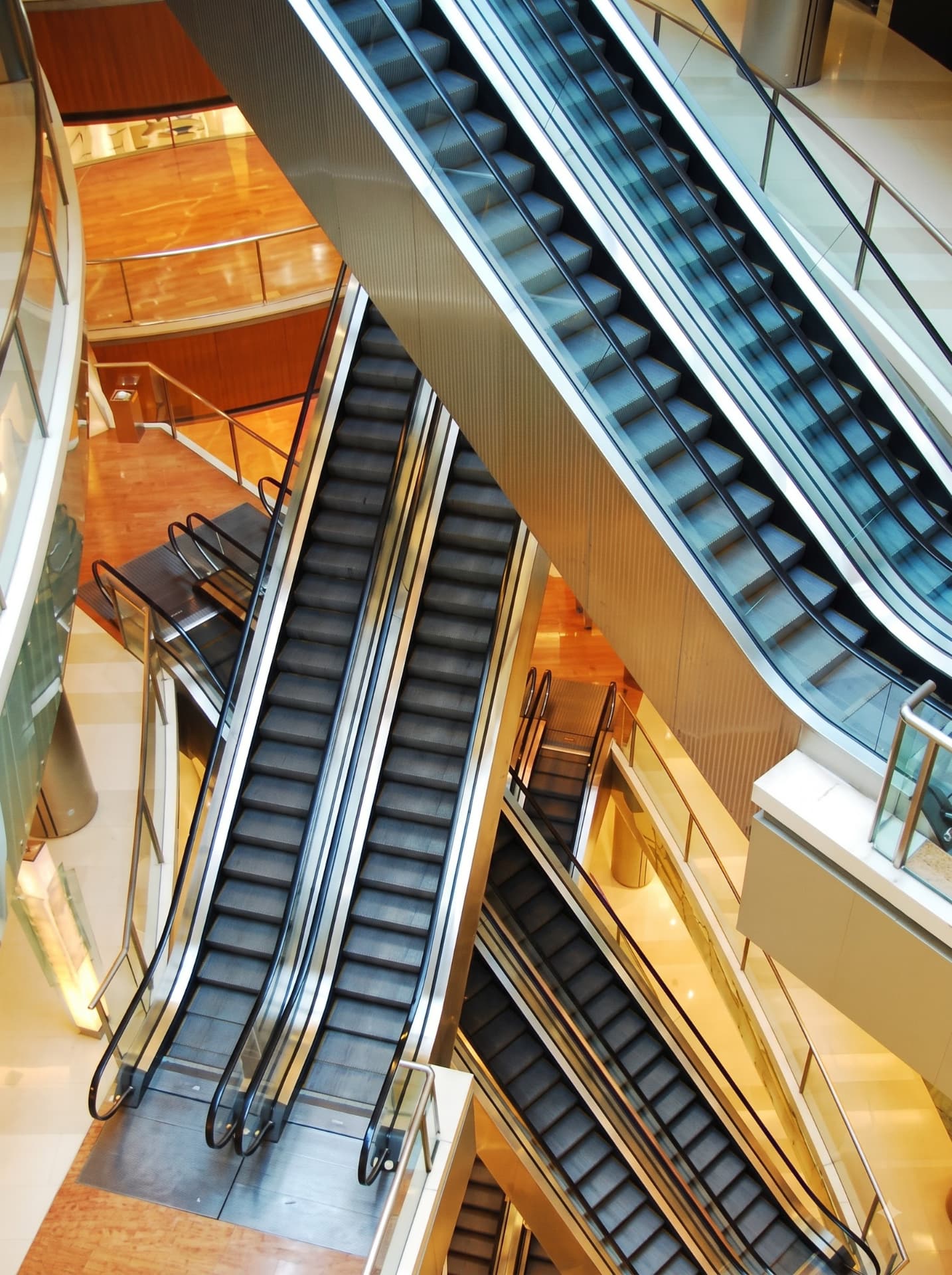 Escalator installation in a multi-level shopping mall