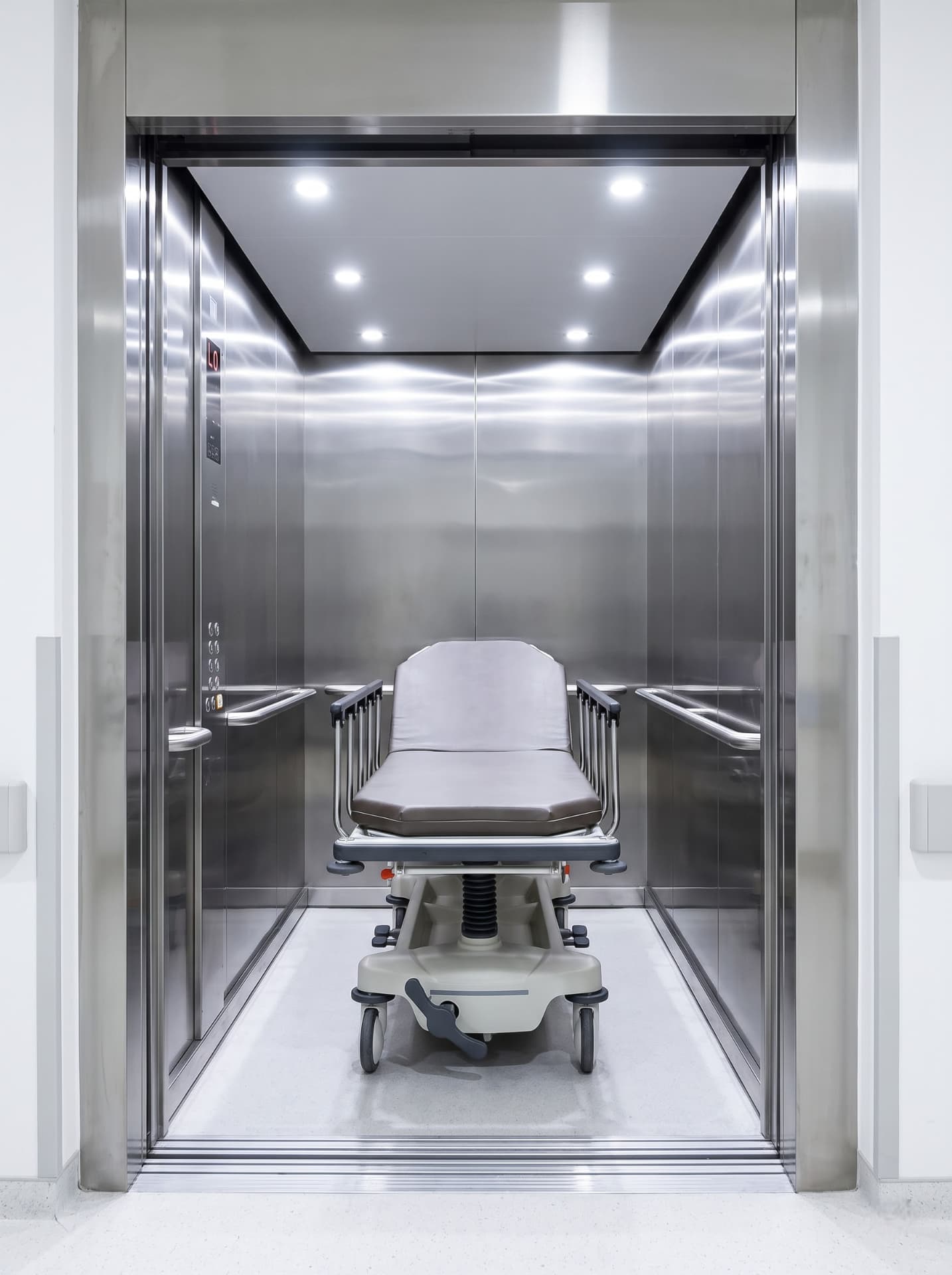 Hospital stretcher lift with a spacious stainless-steel cabin